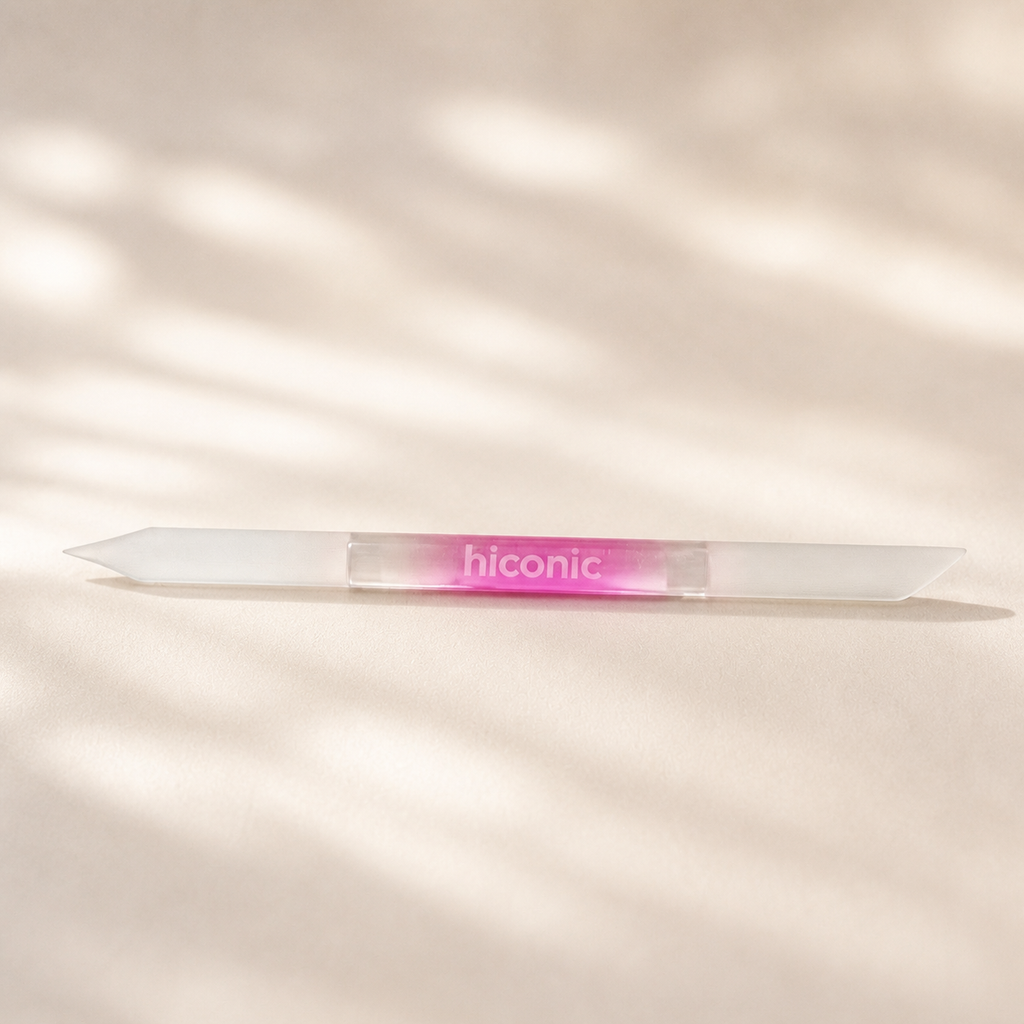 Hiconic glass cuticle pusher with pink gradient handle, front view