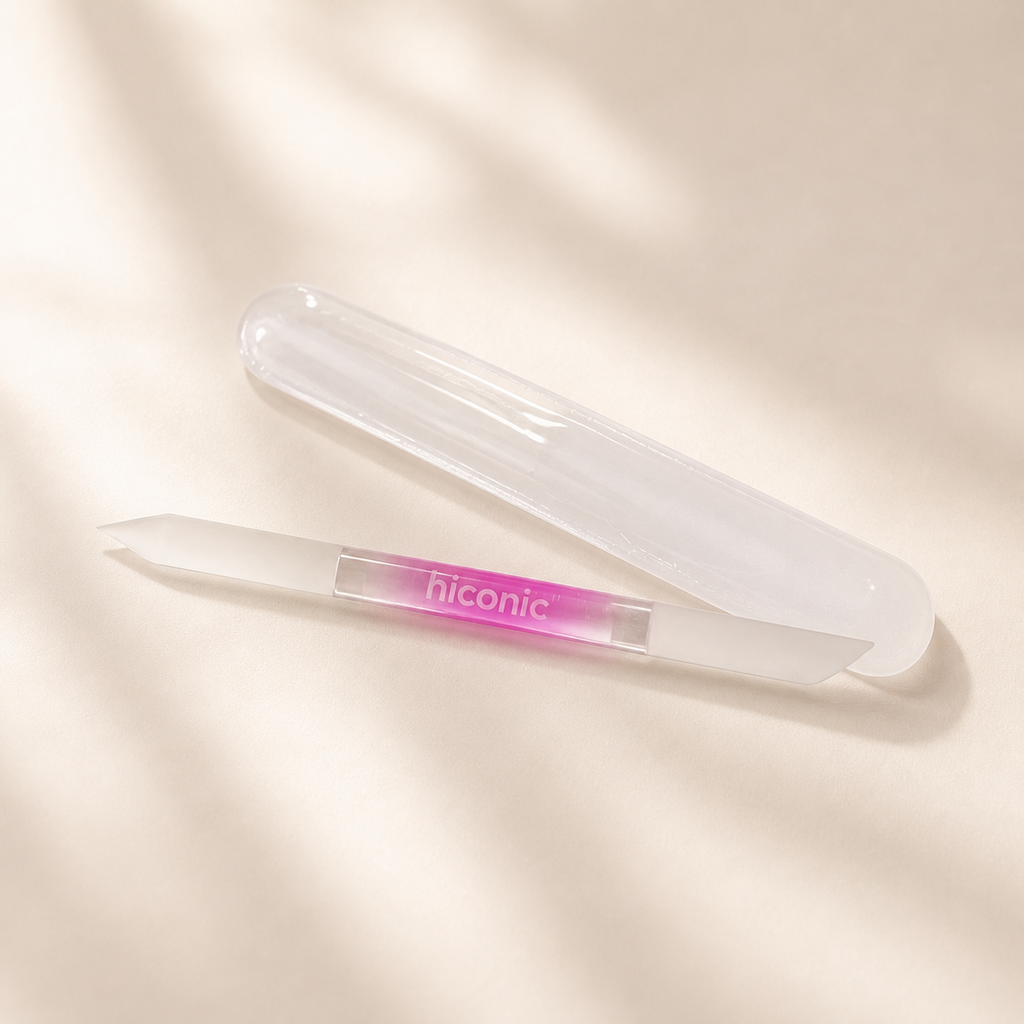 Hiconic glass cuticle pusher beside its clear protective case
